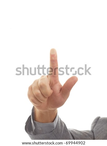 A businessman pressing a virtual button isolated against a white background