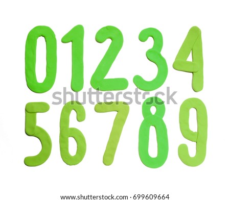 Green plasticine numbers, isolated.