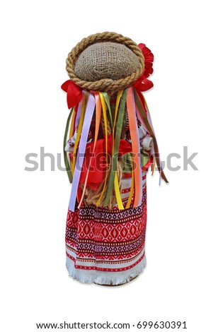 Doll in national Ukrainian costume with ribbons and poppy seeds back view