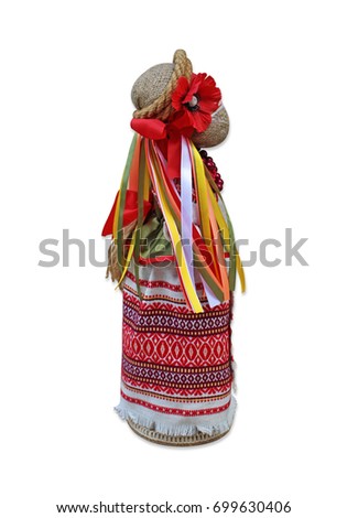 Doll in national Ukrainian costume with ribbons and poppy seeds on the right