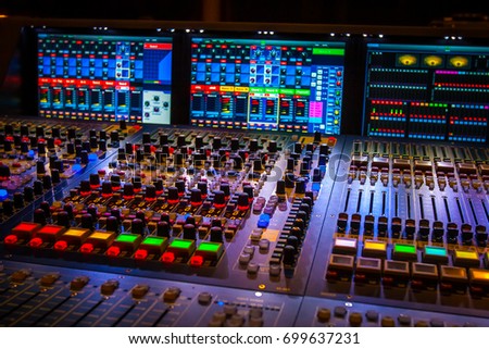 Mixer. Remote control for sound recording. Sound producer at the concert. Equipment for concerts.
