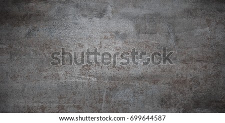 Grunge metal background or texture with scratches and cracks Royalty-Free Stock Photo #699644587