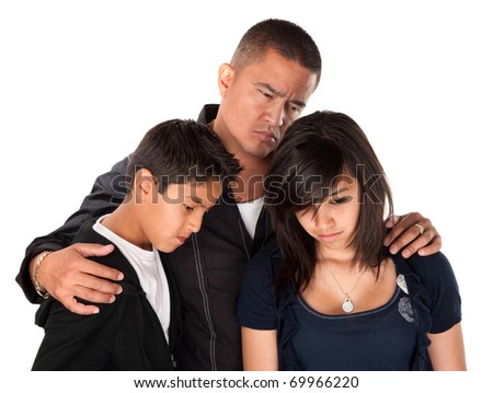 Hispanic father with kids looking down and sad on white background