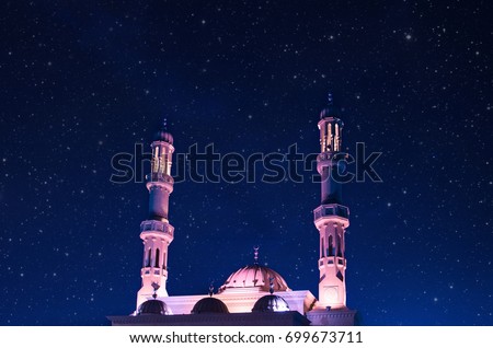 Mysterious mosque against the background of the starry sky. Dubai, United Arab Emirates Royalty-Free Stock Photo #699673711