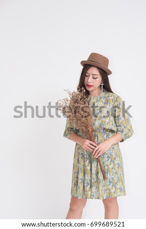 Beautiful young Asian woman with vintage style clothes
