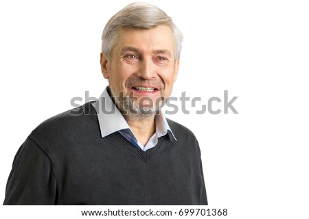 Smiling mature man close up. Portrait of elderly white-skined man smiling on white background.