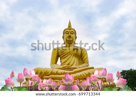 Golden Buddha images on sky clouds background