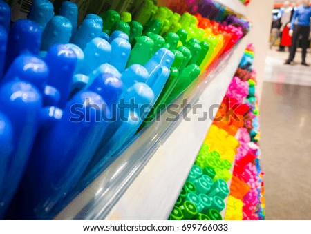 side view of colorful  pen on the shelf at stationery store