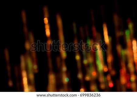 beautiful abstract colorful background, blurred in motion against a black background