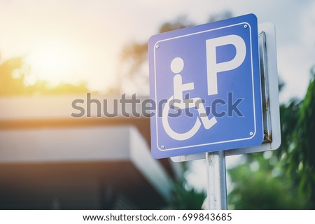 disability car parking sign to reserved space for handicap driver vehicle park