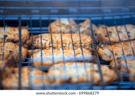 Fried meat on a grid