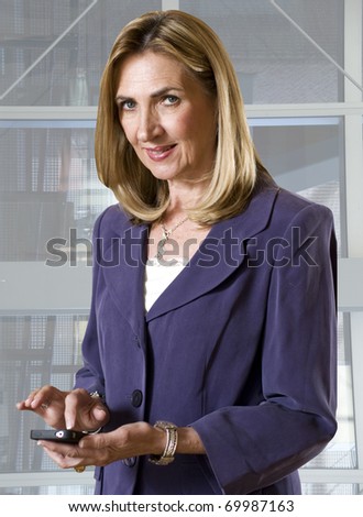 Mature woman with smart phone