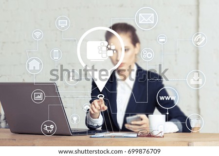 Business woman pressing button data transfer to computer in network.