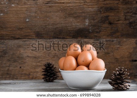 Organic eggs on wooden background. Fresh eggs. Healthy food, Rustic Style.  Easter photo concept. With copyspace