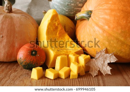 few pumpkin cutting harvest on wooden table
