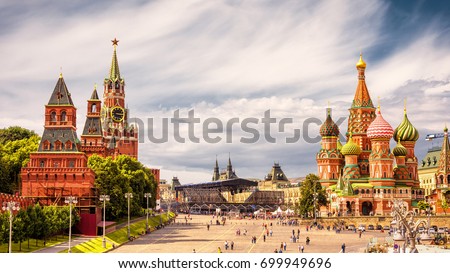 Moscow Kremlin and St Basil's Cathedral, Moscow, Russia. Old Red Square is top tourist attraction of Moscow city and Russia. Panorama of the heart of Moscow, nice skyline in summer. Sightseeing theme Royalty-Free Stock Photo #699949696