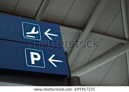Arrivals & Parking Sign at Airport 