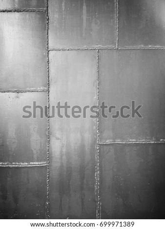 Grunge metal texture, Grey grunge metal textured wall background  Royalty-Free Stock Photo #699971389