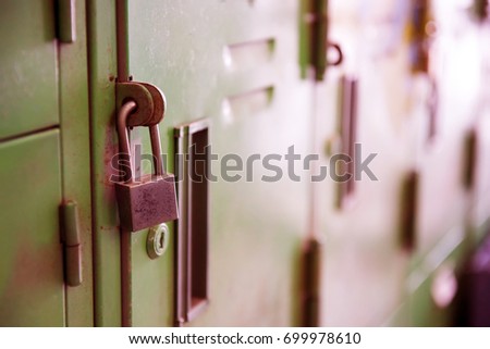  lock on the door of an old Locker, vintage style, close-up focus on lock.