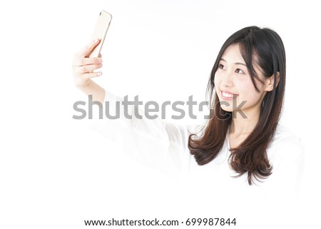 Young woman taking Selfie photos