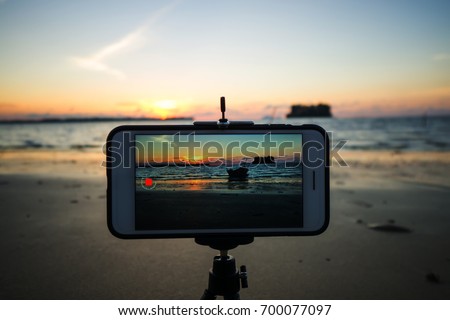 Smartphone video time lapse sunset from a smartphone set on a tripod.