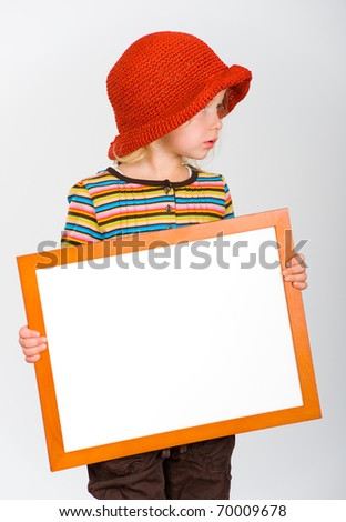 sweet girl with frame and hat
