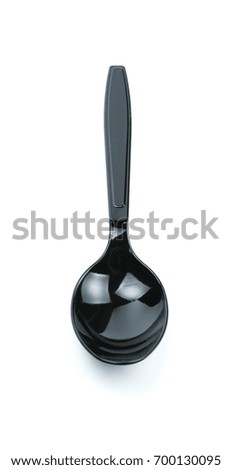 black spoon isolated on white background