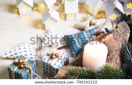 Cosy and soft winter background, knitted sweater and lights
