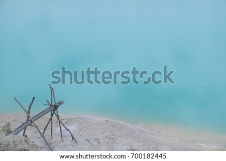 blue lake well known as danau kaolin in belitung island,indonesia