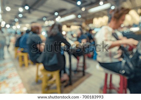 Abstract blurred image of cafeteria for background usage