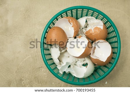Broken eggs shell in the basket