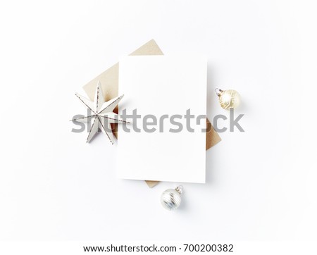 Blank Greeting Card and Christmas Decorations. Flatlay. Christmas background. White background. Copy space. Top view.
