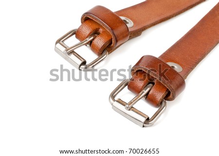 Two brown leather belt, isolated on white background.