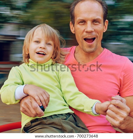 Father and son have fun