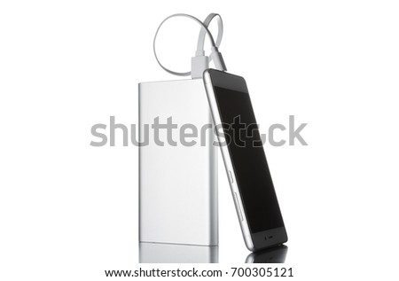 The smartphone is charged from the portable power banks
