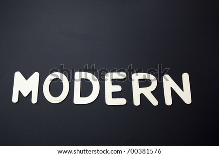 modern word over black background