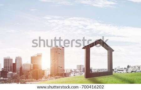 House stone figure as symbol of construction and real estate outdoors