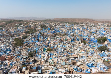 Wide angle picture from Mehrangarh Fort of the city of Jodhpur with many blue houses. Jodhpur is the blue city of Rajasthan in India.