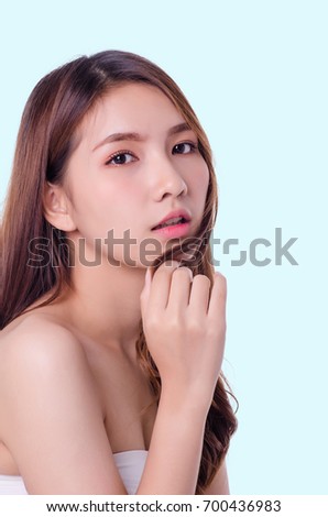 Asian young beautiful woman Beauty portrait , natural make-up, beauty face, isolated over pastel background.