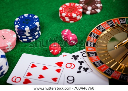 Roulette in casino and Poker Chips.Concept about entertainment and gambling.
