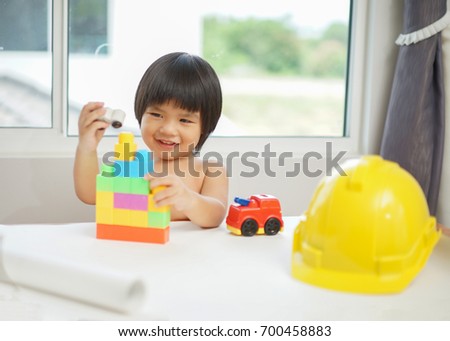 Kids Play Room, Child playing building blocks toys, Development and construction concept 