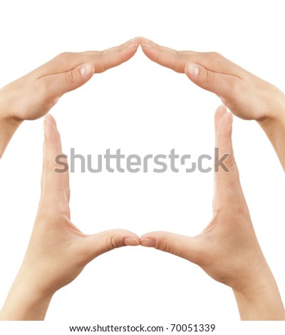 Female hands showing home sign
