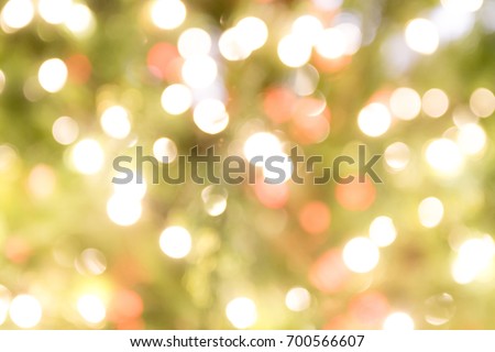 Abstract bokeh lights orange green red color background