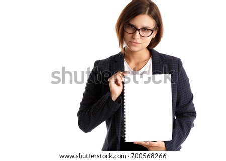 Studio portrait of business woman with a sheet of paper in hands on a white isolated background. Professional model. Pure skin of the face. Glasses. Cute businesswoman