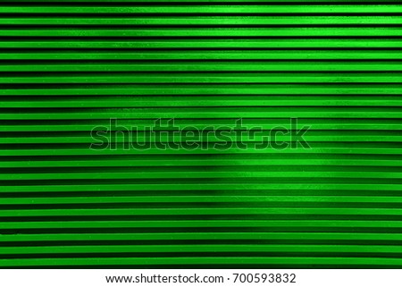 Green color texture pattern abstract background can be use as wall paper screen saver brochure cover page or for presentations background or articles background also have copy space for text.
