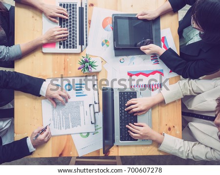 Business people meeting working with new startup project, share idea discussion and analysis data charts and graphs.Business finances and accounting concept
