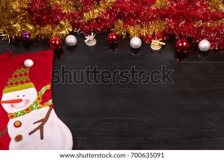 Christmas or New Year decoration on black wood background