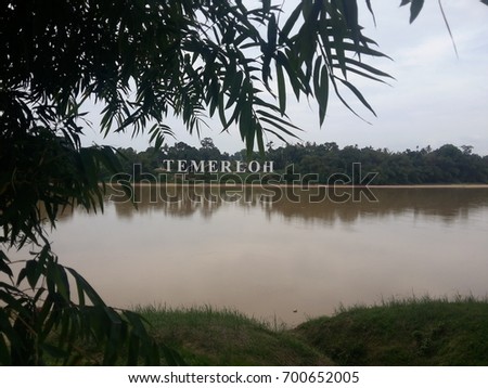 scene behind the river with word temerloh