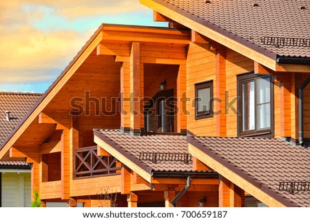 Photo of part wooden house and sun rays.