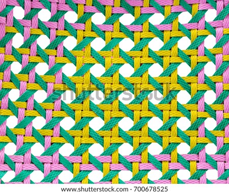 three color plastic ropes basketry pattern on white background